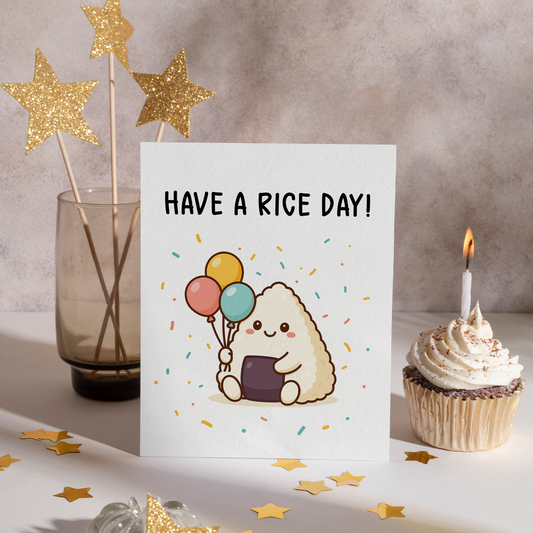 Adorable rice ball character sitting happily with balloons in soft pastel colors. The clean white background and playful details make the design feel light and cheerful.