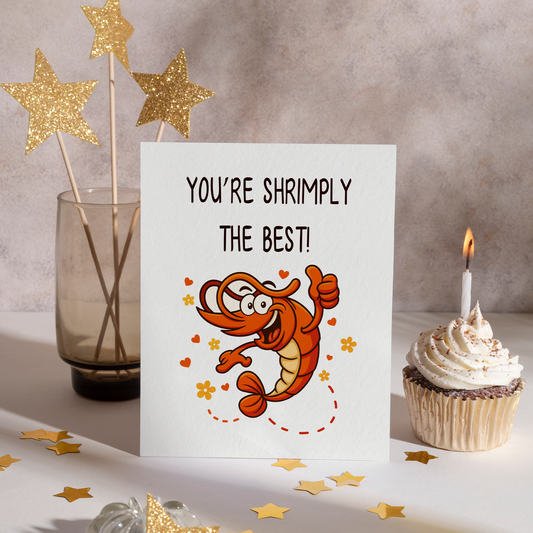 Funny shrimp-themed card featuring an orange shrimp character with a big grin and positive gesture. The bright colors and clean white background make the design cheerful and eye-catching.