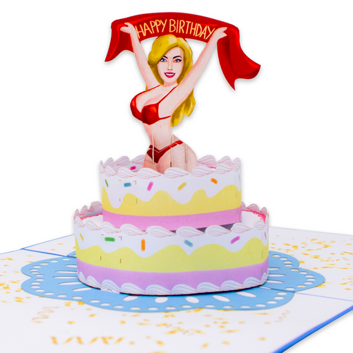 A pop-up card featuring a beautiful woman standing on top of a cake, celebrating joyfully holding a banner that reads, Happy Birthday