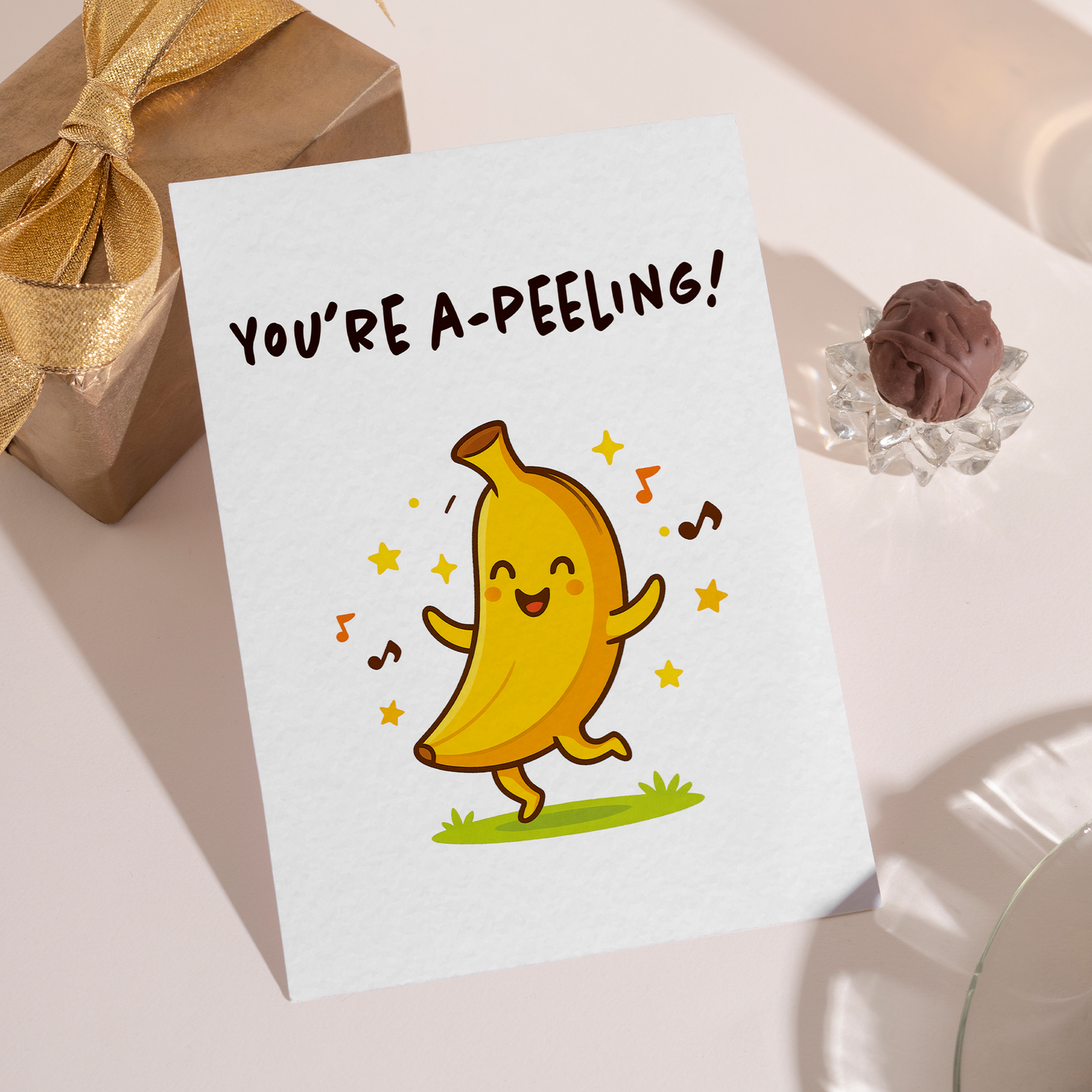 Adorable banana-themed greeting card designed with a smiling character and fun pun message. The clean white background and vibrant colors make the card feel modern, happy, and gift-ready for any occasion.
