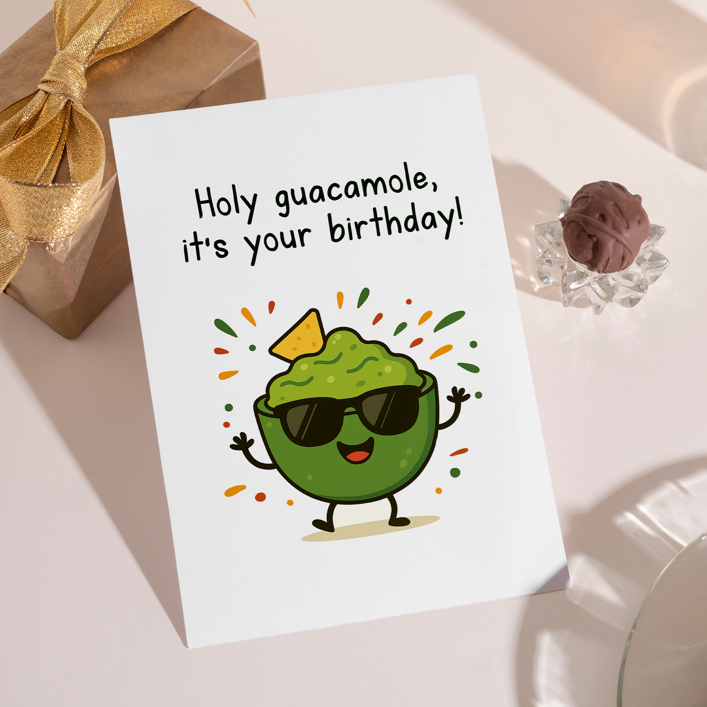Playful food-themed birthday card with a happy guacamole character wearing sunglasses. The fun guac pun and energetic illustration give this card a lighthearted and joyful vibe.