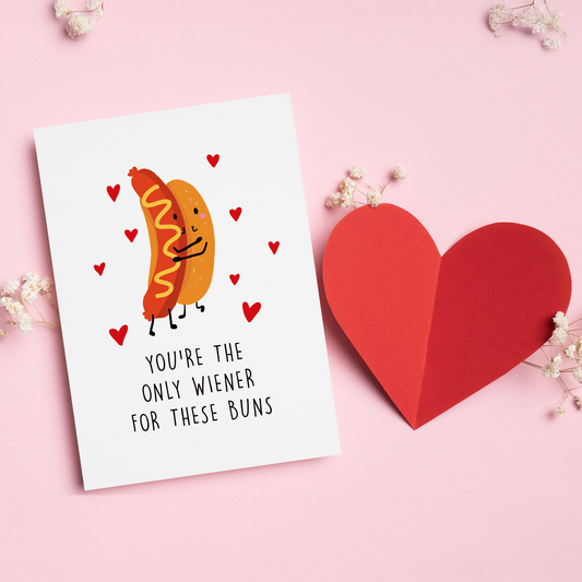 Only Wiener is a playful Valentine’s card for the one who’s perfect for you buns and all. Featuring an adorable hot dog couple and a cheeky food pun, this card is sweet, funny, and full of charm. It’s a lighthearted way to say you’re the only one for me without taking things too seriously.