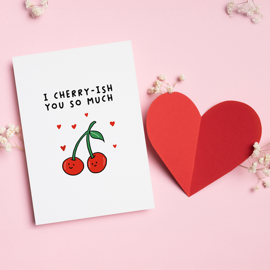 I Cherry-ish You So Much” is a sweet and playful Valentine’s card featuring an adorable cherry pair and a fun food pun. Perfect for couples who love cute humor and lighthearted romance, this charming design is a delightful way to say I cherish you without being overly serious.