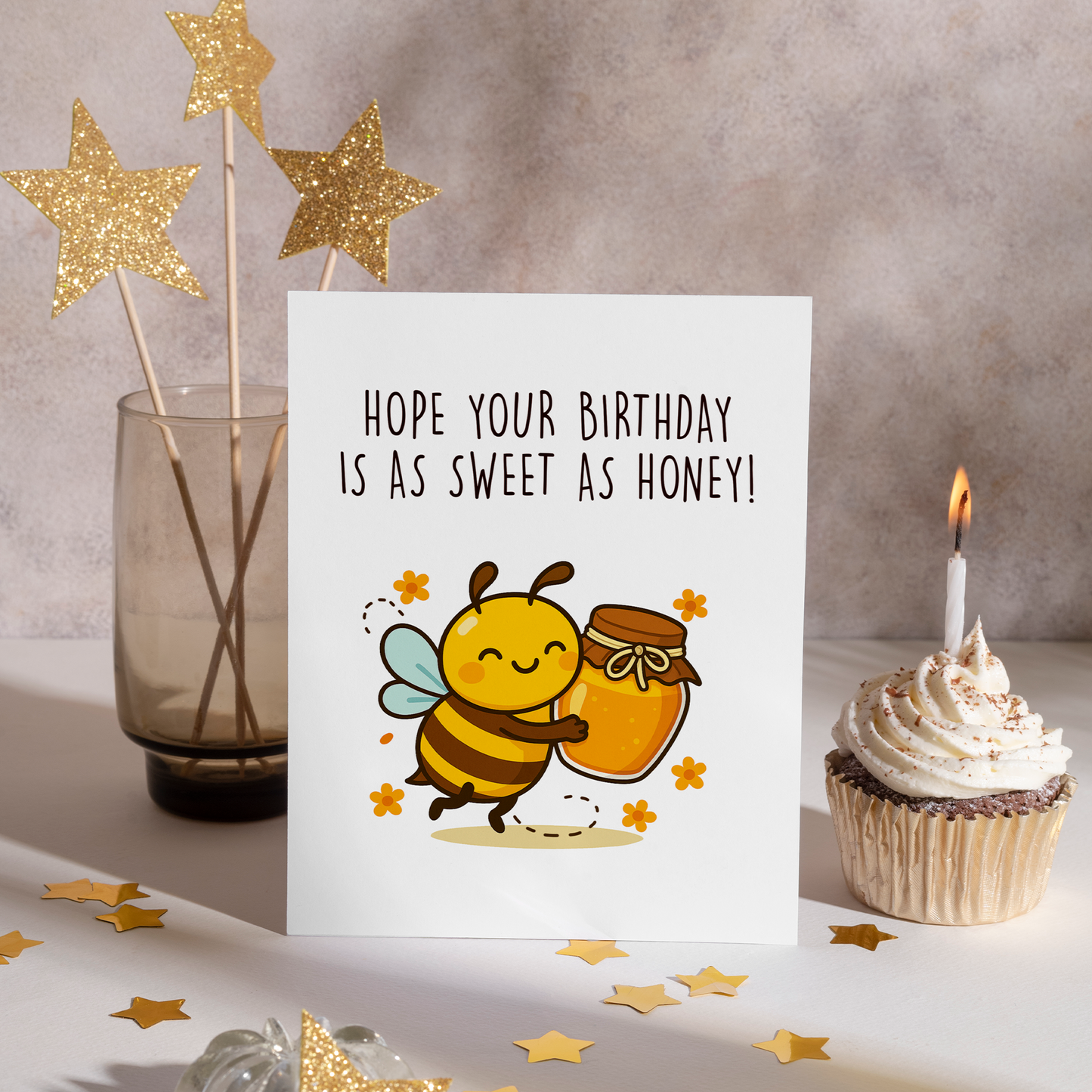 Adorable illustrated birthday card showing a happy bee carrying a golden jar of honey. The soft colors and sweet honey theme make this card feel friendly, cozy, and full of love.