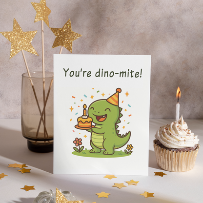 Adorable dinosaur birthday card showing a happy cartoon dino celebrating with a cake and confetti on a white background. The cheerful character and bright details make the card feel sweet and festive.