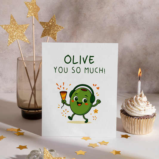 Playful food-themed card featuring a dancing olive with headphones on a clean white background. The bright green character and cheerful pose give off fun and affectionate vibes.