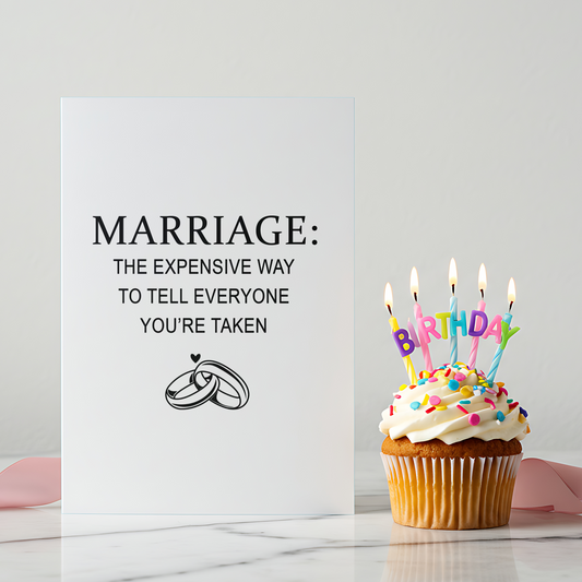 A clean white greeting card featuring a bold marriage quote and simple line art of interlocked wedding rings. Designed for couples who love dry humor, this card works well for wedding celebrations and bridal showers.