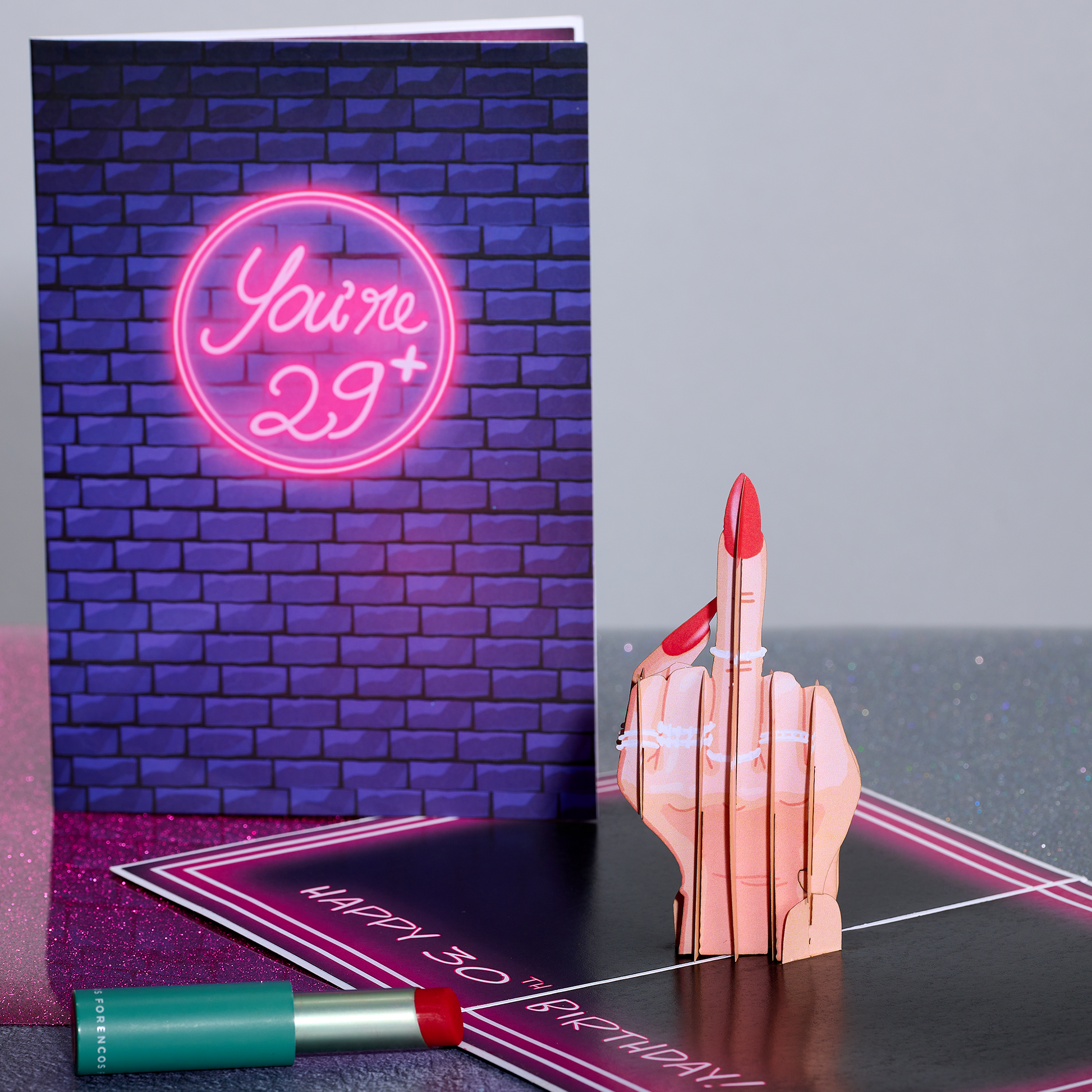 Give the gift of laughter on their 30th birthday with this cheeky card showcasing a hand making a bold gesture and a heartfelt wish!