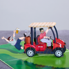 A hilarious pop-up card shows two men in a golf cart, laughing and having a great time.