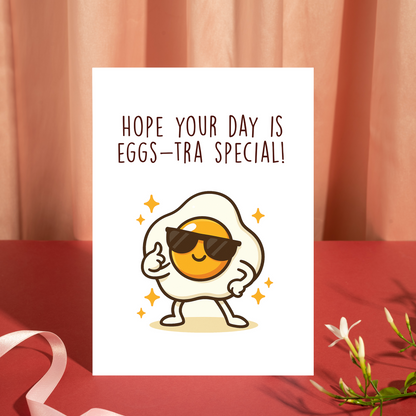 Whimsical greeting card with a cartoon fried egg wearing sunglasses and standing proudly. The eggs-tra special theme adds humor and charm, making it perfect for birthdays or encouragement.