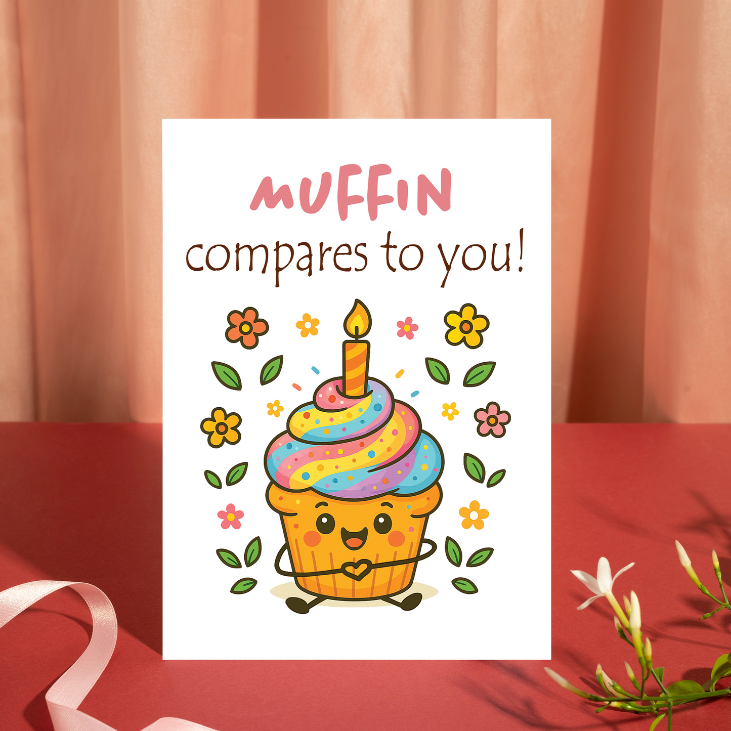 Whimsical birthday card showing a happy cupcake surrounded by flowers and confetti. The playful “Muffin compares to you!” message makes it perfect for celebrating someone special.