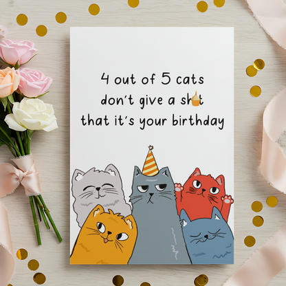 Sassy cat birthday card showing a group of colorful cartoon cats, one wearing a party hat. Perfect for cat lovers who enjoy bold and honest humor.