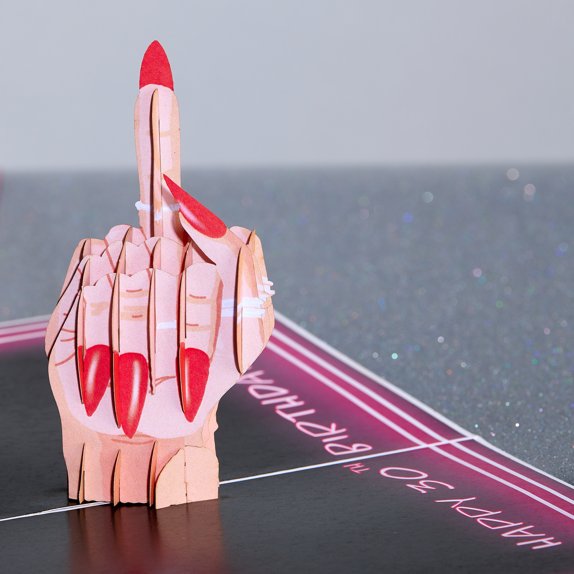 Make their 30th birthday unforgettable with this amusing card showing off a rebellious hand and a cheerful greeting!