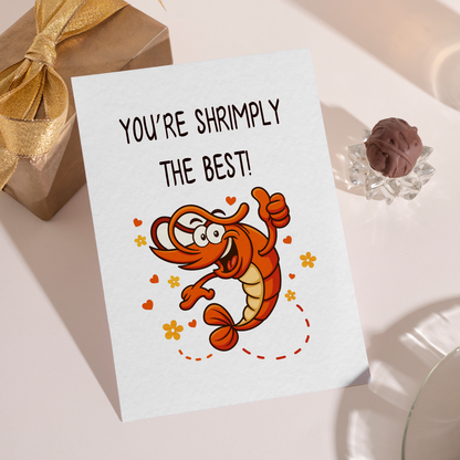Whimsical greeting card with a cute shrimp character expressing encouragement and praise. The joyful pose and warm color palette create a friendly and uplifting vibe.