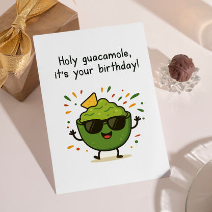Playful food-themed birthday card with a happy guacamole character wearing sunglasses. The fun guac pun and energetic illustration give this card a lighthearted and joyful vibe.