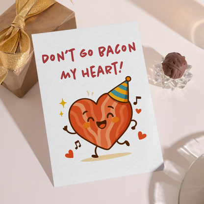 Whimsical greeting card featuring a bacon heart character surrounded by hearts and sparkles. This cute pun card is ideal for expressing affection in a fun way.