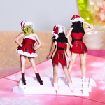 Three women wearing Santa hats and dressed as Ms. Santa are ready to bring laughter and festive spirit to your Christmas card. Enjoy the merry vibes!