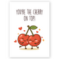 Cute greeting card featuring two smiling cartoon cherries holding hands with hearts floating around them. The message “You’re the cherry on top” adds a sweet and playful compliment perfect for celebrating someone special.