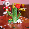 An amusing pop-up birthday card showcasing a cactus and a deflated birthday balloon. Full of laughter!