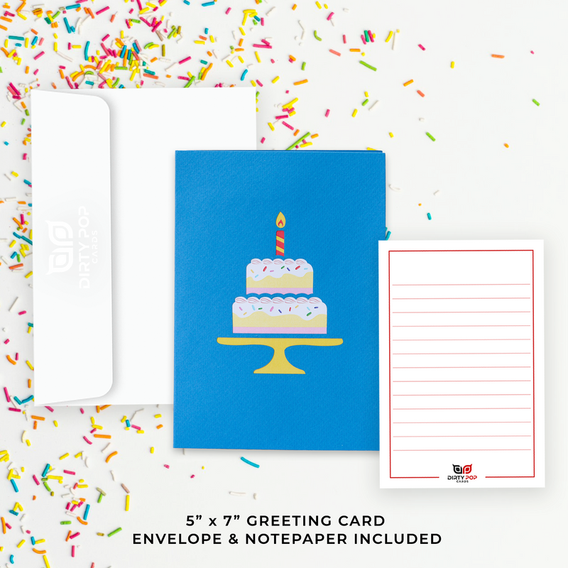A colorful birthday cake surrounded by candles on a greeting card.