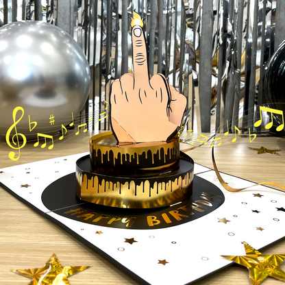Birthday card with a hand holding a candle on a cake, surrounded by musical notes and decorations.