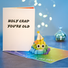 Celebrate a special day with a funny pop-up birthday card featuring a rainbow poop emoji. It's a colorful surprise that will bring joy!