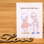 This adorable anniversary card captures the essence of love and humor. It depicts a sweet older couple, holding hands and exchanging loving glances.
