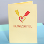 Check out this amusing Valentine's Day card! Mustard and ketchup create a heart shape with their sauce, and the text reads, "I love your personality but..."