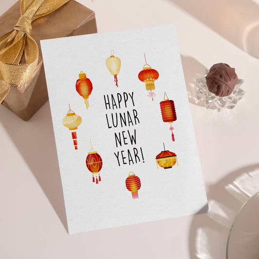 Illustration of traditional Lunar New Year lanterns arranged around centered holiday text. The design feels modern, calm, and suitable for a wide range of recipients.