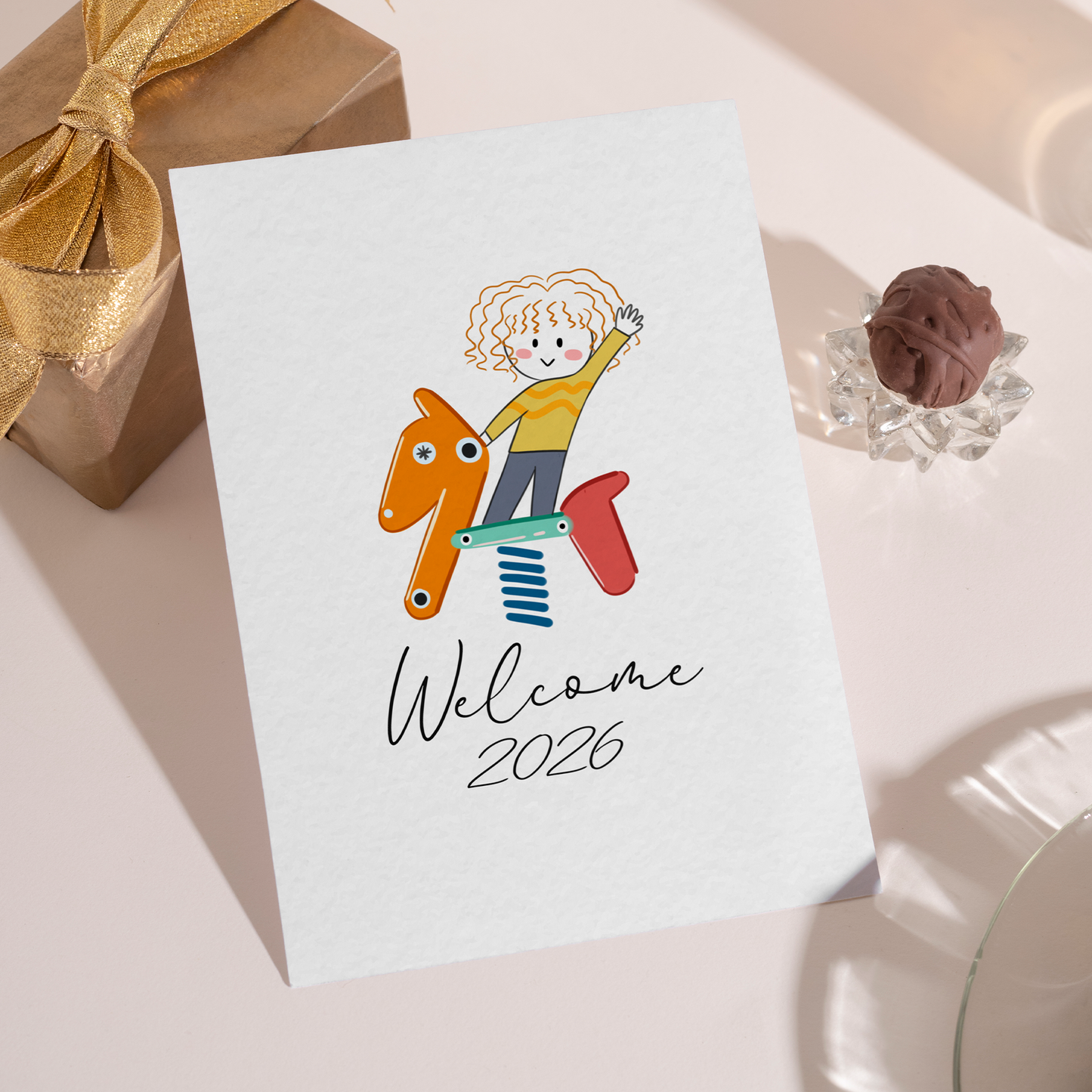 Cute illustration of a child waving while sitting on a spring toy forming the numbers 2026. The design feels lighthearted, optimistic, and perfect for celebrating new beginnings.