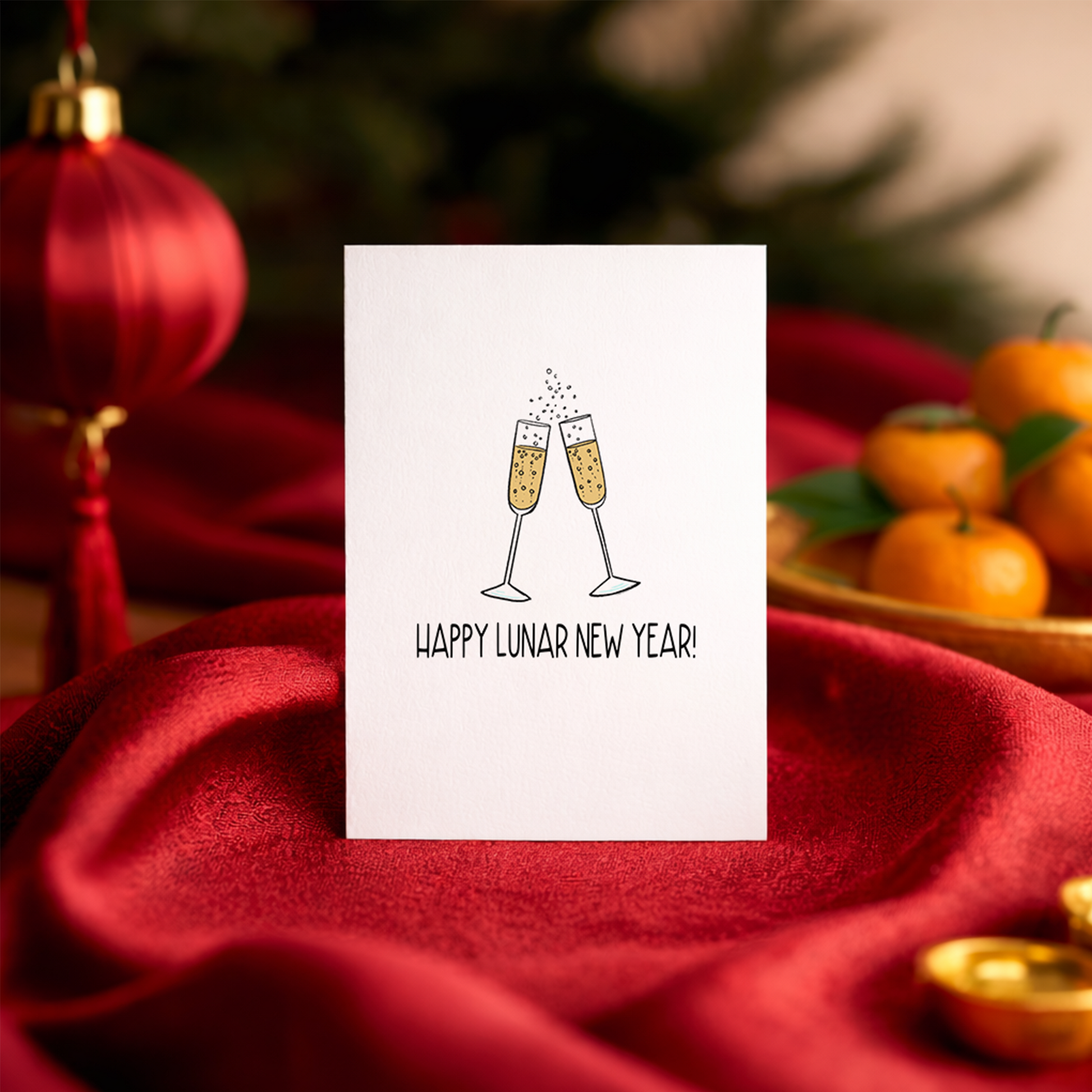 Elegant Lunar New Year card with two sparkling champagne glasses touching at the top. The artwork represents celebration, optimism, and a lucky start to the year.