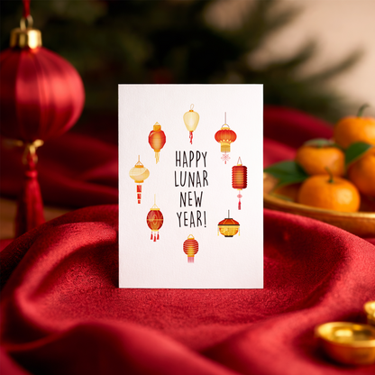 Festive Lunar New Year card with multiple lantern styles symbolizing luck and celebration. The soft color palette keeps the look refined and welcoming.