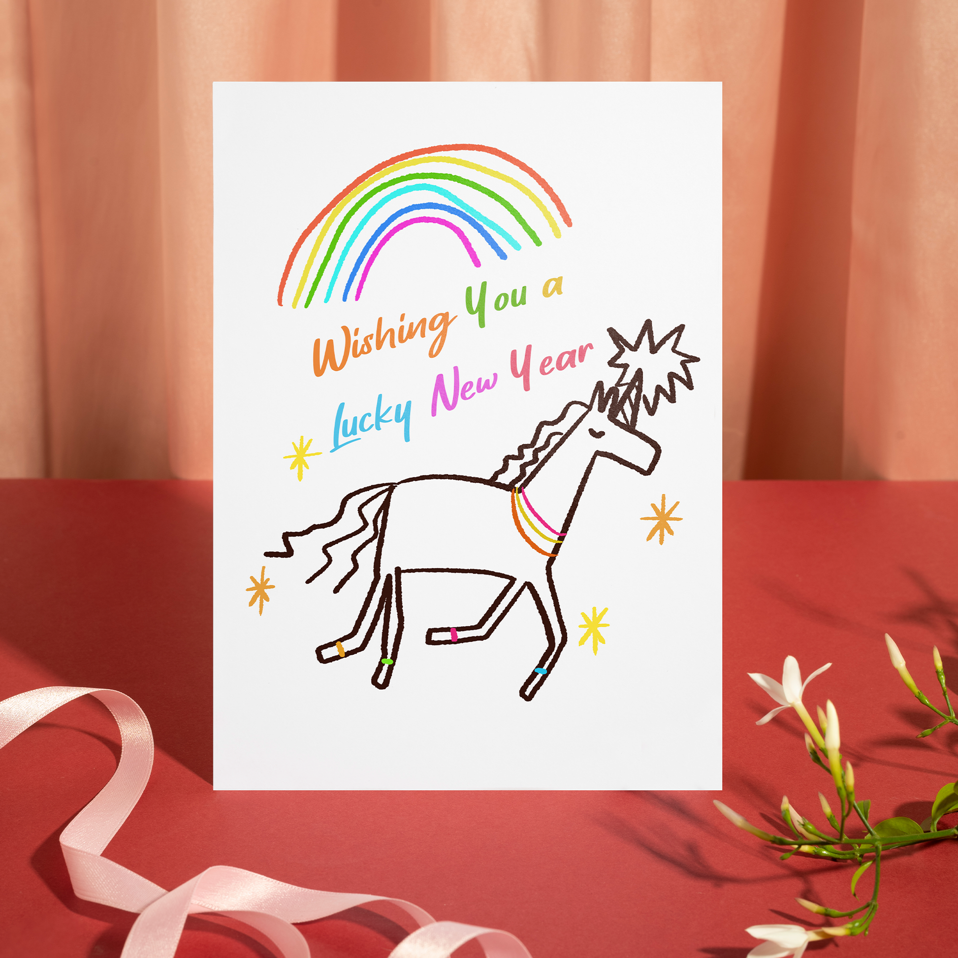 Adorable illustrated card with a unicorn, rainbow, and star accents celebrating a lucky new year. The design feels cheerful, uplifting, and perfect for new beginnings.