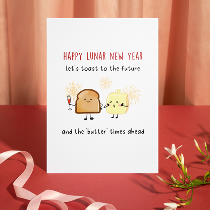 Playful New Year illustration featuring toast and butter characters celebrating with champagne. The lighthearted style and pun-filled message express positive energy and good fortune.