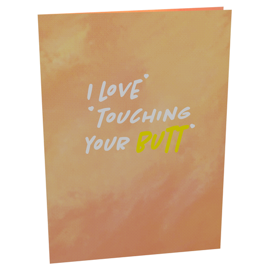A card with the text I love touching your butt written on it. Perfect for a cheeky and playful gesture.