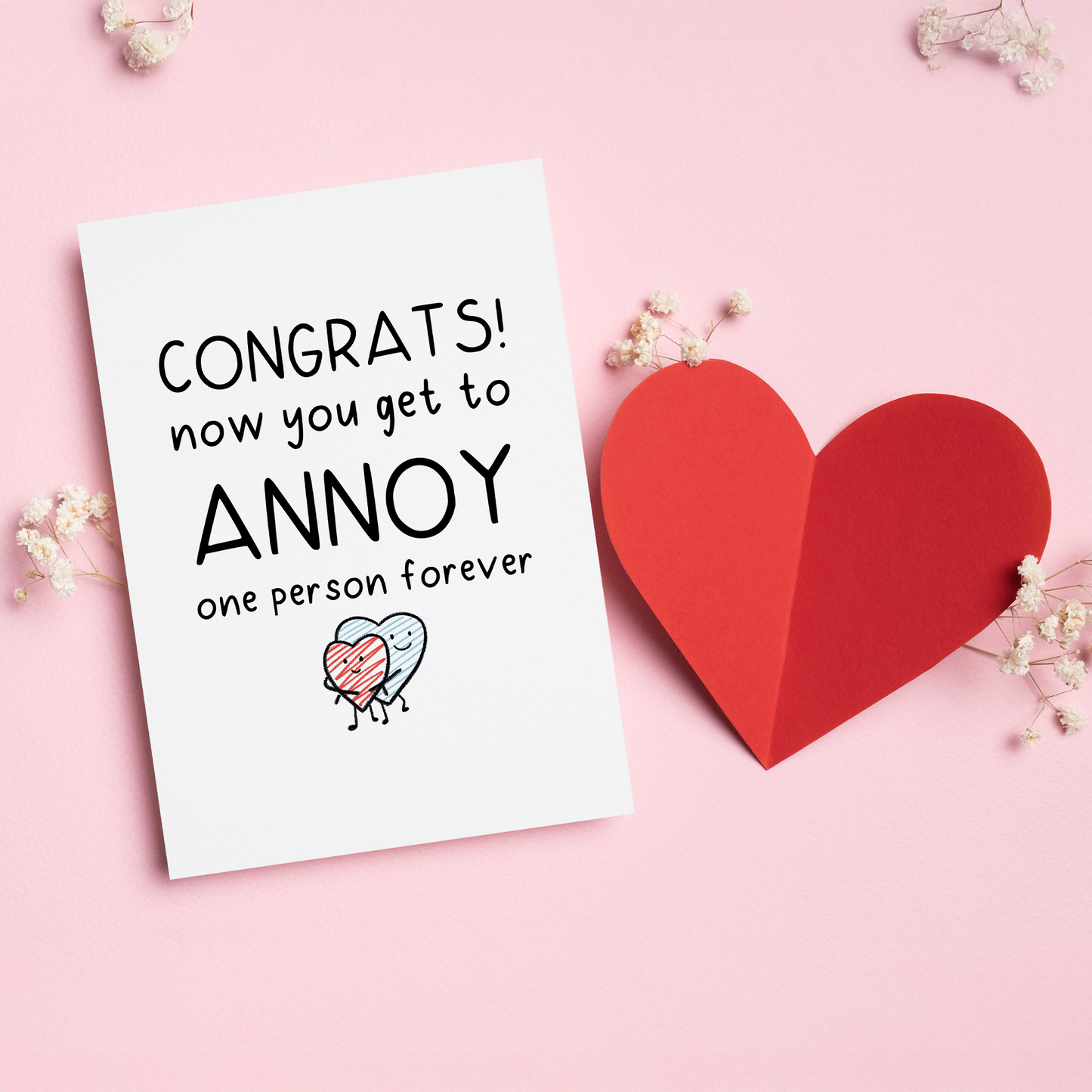 Congrats, You’re Taken is a funny love card for couples who know that love means choosing the same person and annoying them forever.&nbsp;With a playful illustration and cheeky message, this card is perfect for Valentine’s Day, engagements, anniversaries, or just reminding your partner that they’re officially stuck with you.