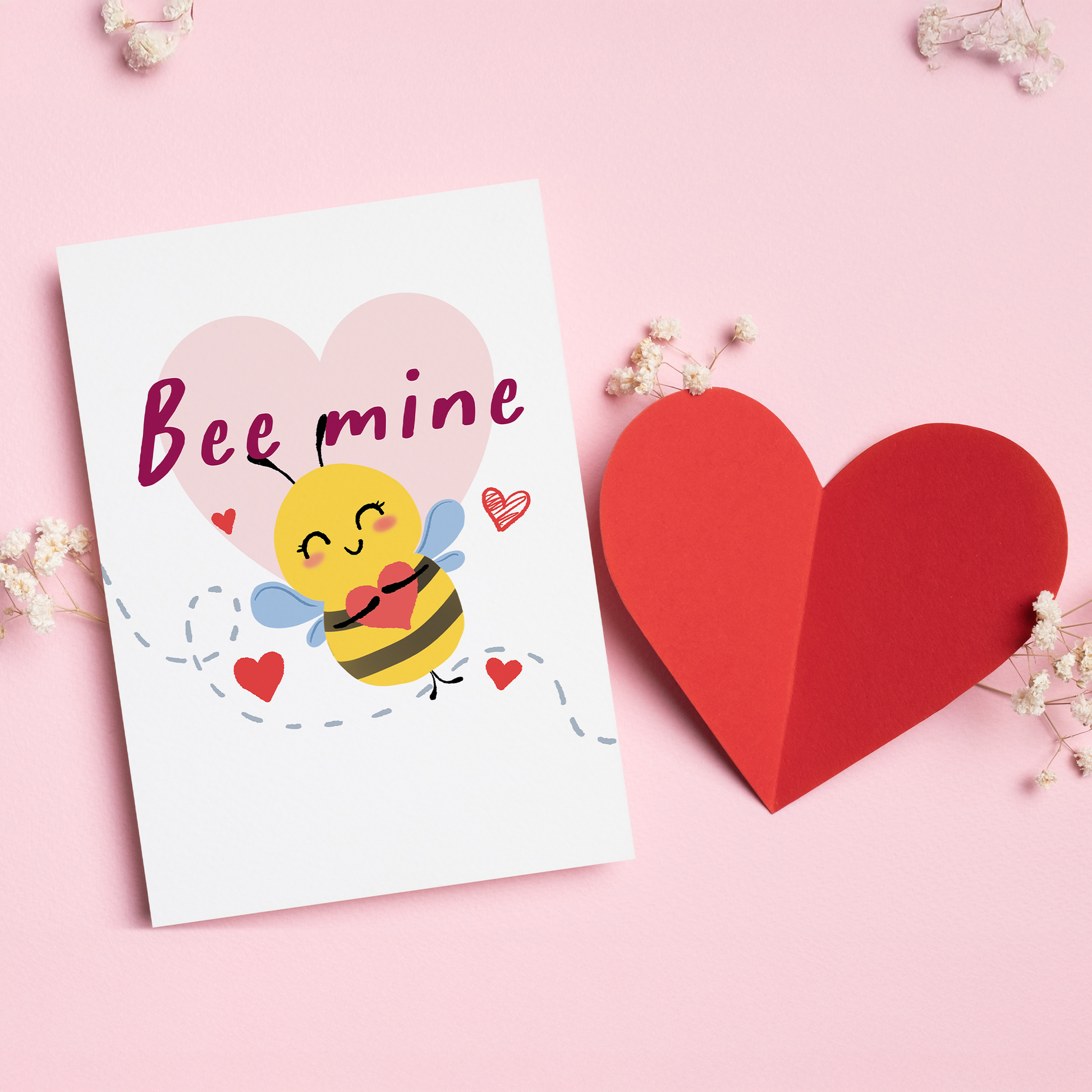 Bee Mine is a sweet and cheerful Valentine’s card that’s full of love and charm.&nbsp;Featuring an adorable bee holding a heart, this card is perfect for spreading happiness and affection in the cutest way possible. Simple, playful, and timeless, it’s a classic Valentine design that never goes out of style.