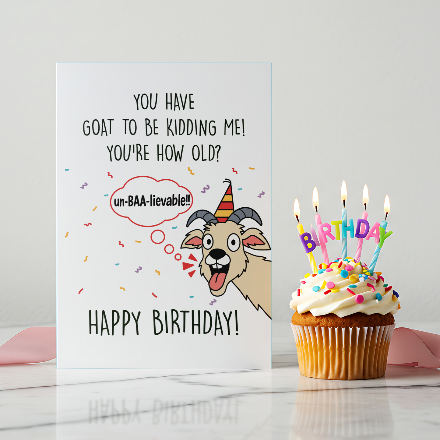 A cheerful birthday card showing a goat reacting in shock with a party hat and speech bubble. The fun illustration and witty message create a joyful and amusing birthday surprise.