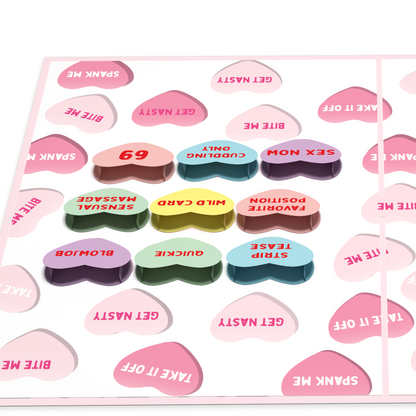 A greeting card featuring colorful candy hearts with playful phrases such as 69, Cuddling Only, Sex Now, and Wild Card. The background is filled with additional flirtatious messages like Bite Me and Get Nasty.