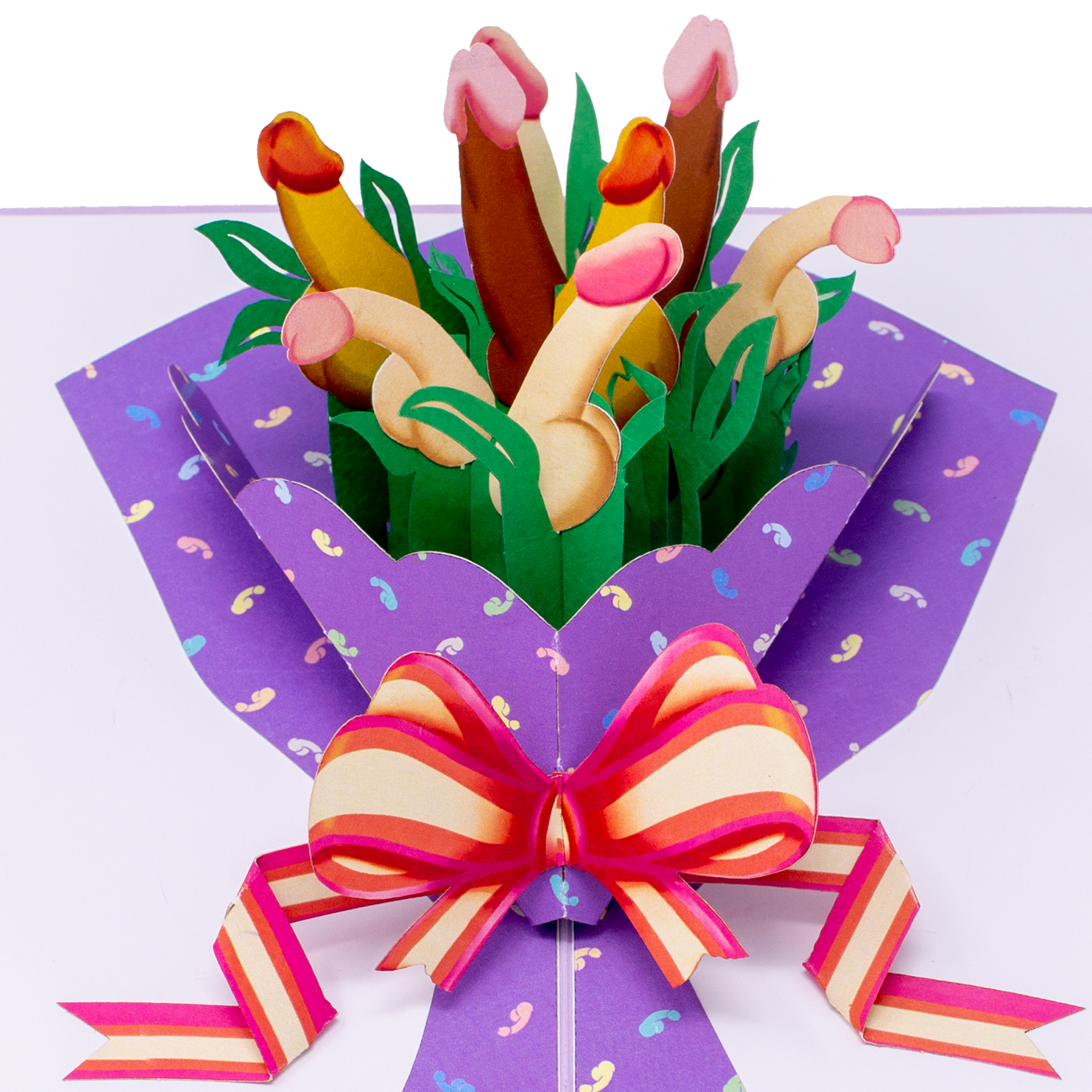 A colorful pop-up card featuring a bouquet with playful, abstract shapes resembling phallic symbols in various skin tones, surrounded by green leaves and wrapped in a purple paper with a pink and yellow striped bow.