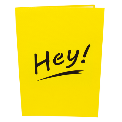 A bright yellow greeting card with the word Hey! written in bold black lettering. The simple, eye-catching design conveys a casual and playful tone.