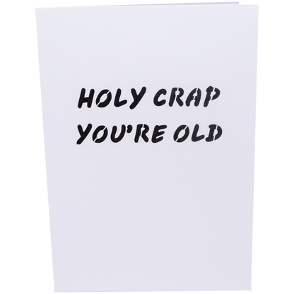 A humorous birthday card with the text holy crap you're old written on it. Perfect for a fun-loving friend or family member's birthday celebration!
