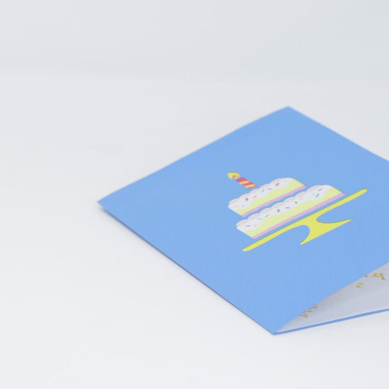 Video of a colorful birthday cake greeting card with candles and festive decorations. Perfect for sending birthday wishes!