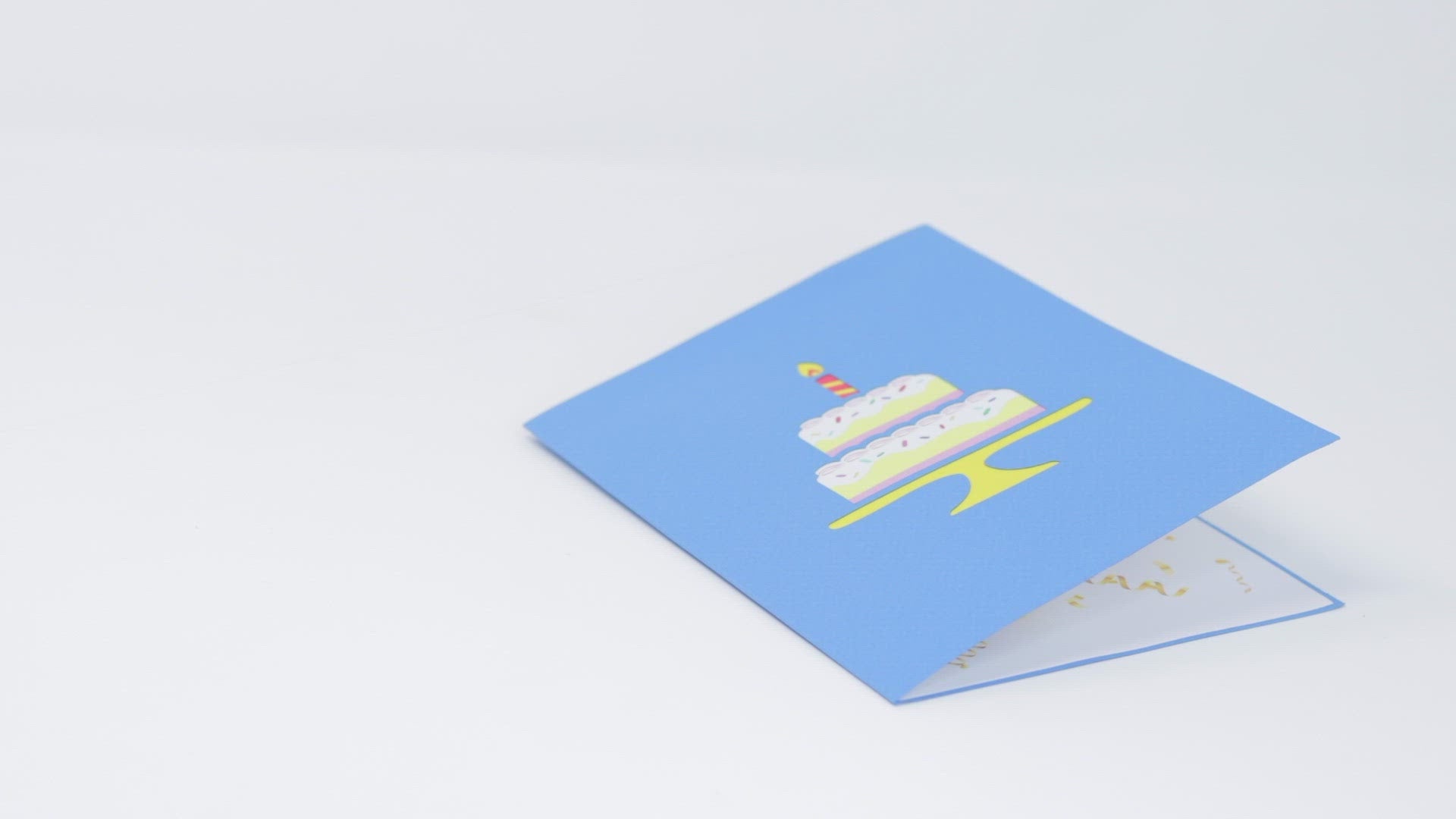Video of a colorful birthday cake greeting card with candles and festive decorations. Perfect for sending birthday wishes!